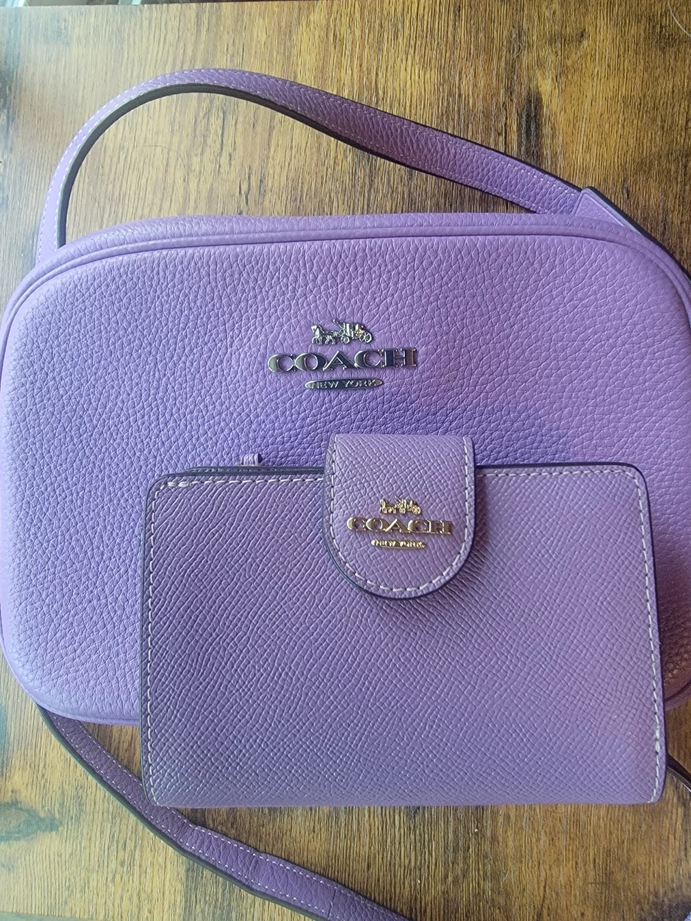 Coach Lilac Pebble Leather Crossbody Bag and matching wallet.